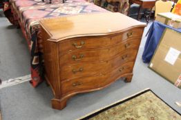 A good George III style mahogany serpentine fronted four drawer commode.