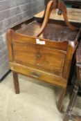 A mahogany commode.