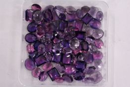 A box of loose coloured stones.