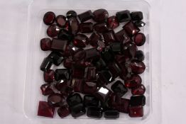 A box of loose coloured stones.
