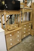 Victorian pine furniture to include a dressing chest, a chest of drawers, a side table and wash