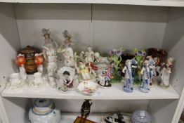 Decorative ornaments and a Doulton tobacco jar.