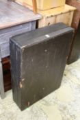 A large leather cloth covered storage box.