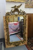 An 18th / 19th century carved giltwood mirror with Ho Ho bird cresting (later gold painted.