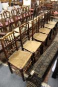 Six 19th century Lancashire spindle back and rush seated dining chairs.
