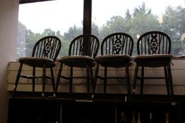 Four wheel back chairs.