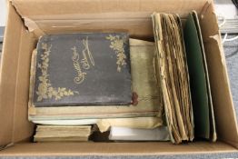 A good collection of cigarette cards and postcards in albums and loose.