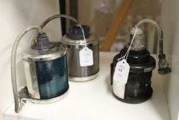 Three small lanterns.