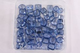 A box of loose coloured stones.