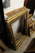A quantity of picture frames.