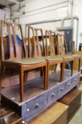 A set four Scandinavian teak dining chairs.