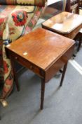 A 19th century mahogany drop flap table.