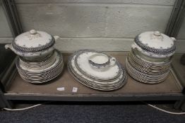 A quantity of classical style dinner ware.