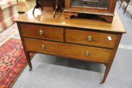 A mahogany chest of drawers.