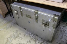A large aluminium storage trunk.