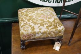 A 19th century mahogany foot stool.