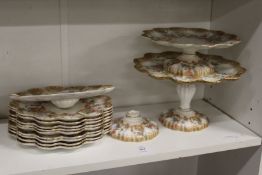 James Green & Nephew, London, a part dessert service, floral decorated with gilt borders, one