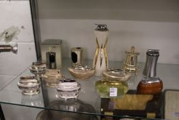 A quantity of table lighters.