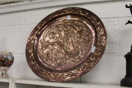 A good large Arts & Crafts circular copper dish with embossed decoration.