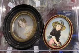 Two oval miniatures of young ladies.