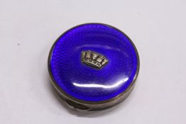 A small silver and enamel compact (AF).