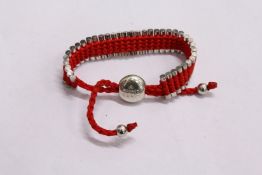 A decorative bracelet, probably Links of London.