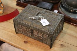 A metal bound casket.