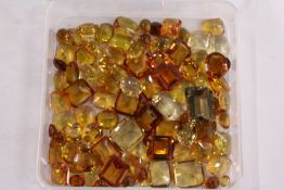 A box of loose coloured stones.