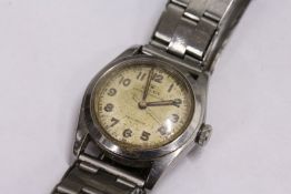 A Rolex Oyster Speed King Precision mid size stainless steel wristwatch.