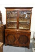 A 19th century mahogany cupboard bookcase.