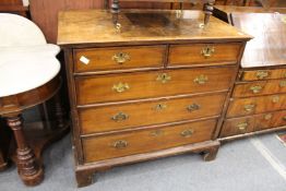 An 18th century walnut chest of drawers.