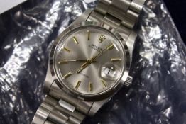 A gent's stainless steel wristwatch.