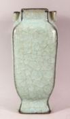 A CHINESE SONG STYLE CRACKLE GLAZE PORCELAIN VASE - with twin handles, the base with a raised