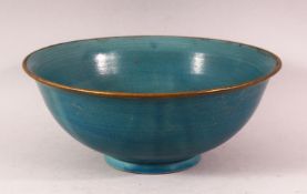 A CHINESE SONG STYLE BLUE CELADON PORCELAIN BOWL, the interior incised with calligraphy as the foot,