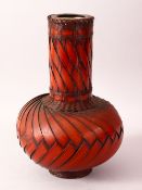A JAPANESE MEIJI PERIOD WOVEN BOTTLE NECK IKEBANA VASE - with twisted woven pattern, with a