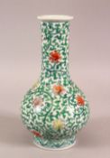 A SMALL CHINESE FAMILLE VERTE PORCELAIN VASE, profusely painted with flowers and vines, six