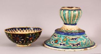 A 19TH CENTURY TURKISH KUTAHIYA BOWL, together with a similar candlestick, the bowl painted with