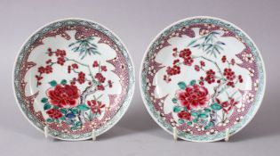 A PAIR OF 19TH CENTURY CHINESE FAMILLE ROSE DISHES, each decorated with floral decoration in
