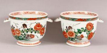 A PAIR OF 18TH / 19TH CENTURY CHINESE FAMILLE VERTE PORCELAIN COOLERS - each with twin handles and