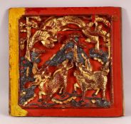 AN UNUSUAL CHINESE LACQUERED CARVED WOOD PANEL, the panel carved with kylin and phoenix, possibly