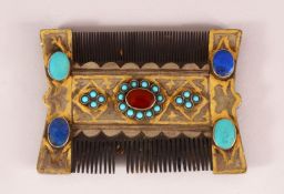 A TURKMAN INLAID COMB - inlaid with semi precious stones including lapis, turquoise and other, the