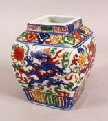 A SMALL CHINESE WUCAI STYLE VASE, the body painted with dragons and flowers, six character mark to