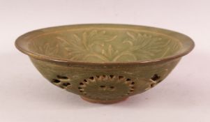A CHINESE LONGQUAN STYLE CELADON GLAZED DISH - the interior carved with flora , of double skin