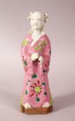 A 19TH CENTURY CHINESE FAMILLE ROSE PORCELAIN FIGURE, decorated cloak in pink ground with floral
