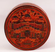 A 20TH CENTURY CHINESE CYLINDRICAL LIDDED LACQUER BOX - decorated with figures in garden settings