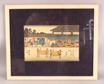 A JAPANESE FRAMED WOOD BLOCK PRINT - depicting figures in village life, 58cm x 48cm