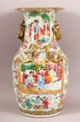 A 19TH CENTURY CHINESE CANTON FAMILLE ROSE PORCELAIN VASE - with panel decoration of figures, flora,