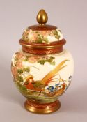 A JAPANESE 19TH / 20TH CENTURY SATSUMA LIDDED VASE - the small vase with decoration of native