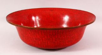 A LARGE CHINESE RED GROUND CLOISONNE BOWL, 38cm diameter, 12.5cm high.