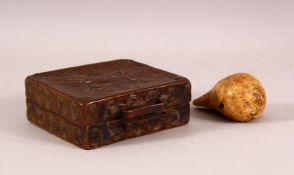 AN EARLY TIBETAN CEREMONIAL SHELL AND AN 18TH CENTURY COPPER BOX, the shell possibly 16th century,